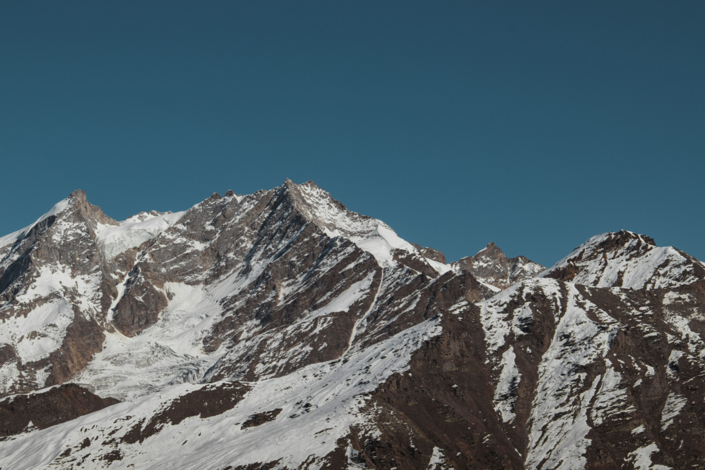 Trekking in India in the Himalayan mountains with snow covered peaks