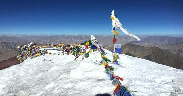Trekking in India in the Himalayan mountains with snow covered peaks